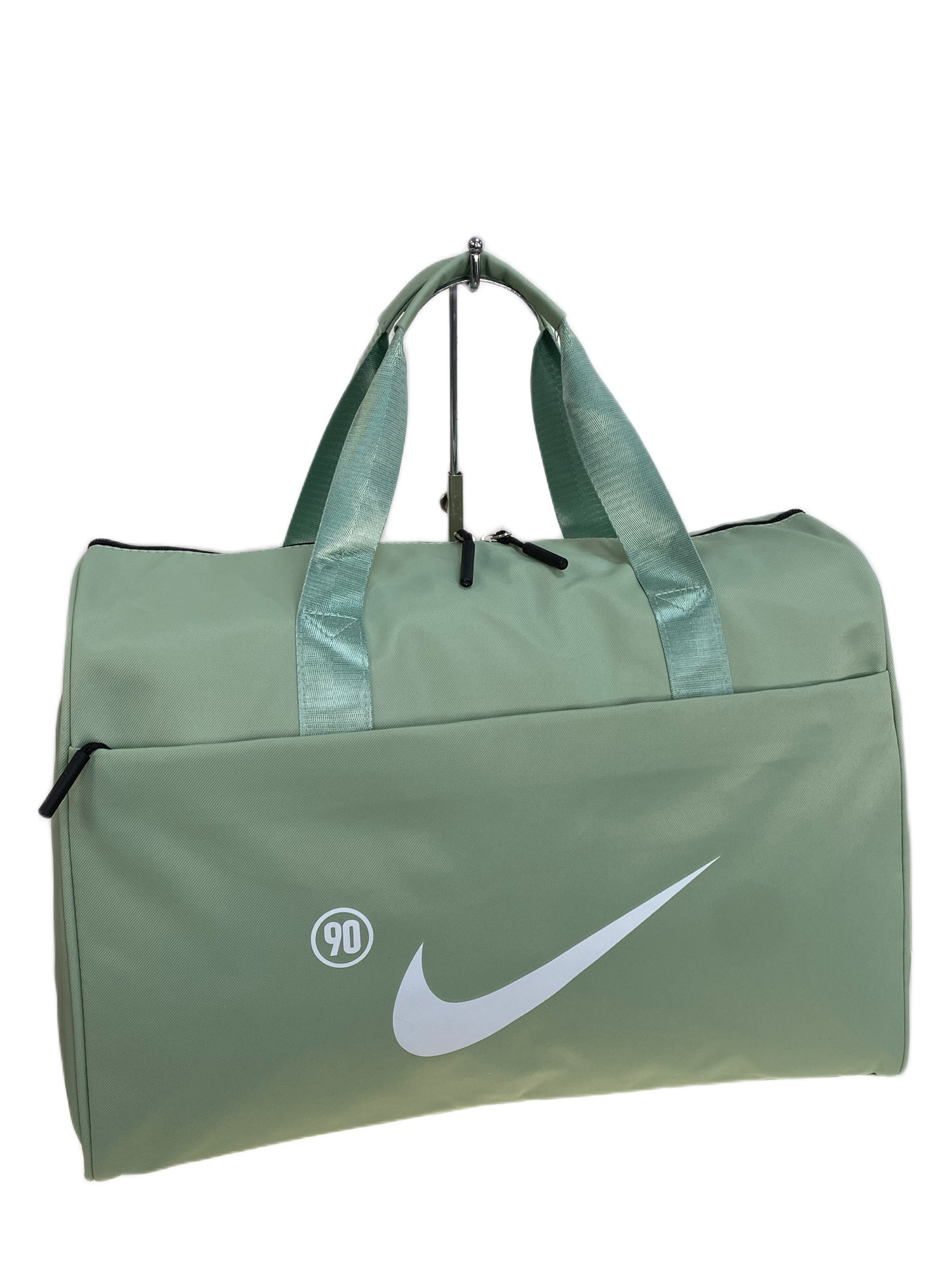 На фото 1 - Дорожная сумка из текстиля, цвет светло зеленый