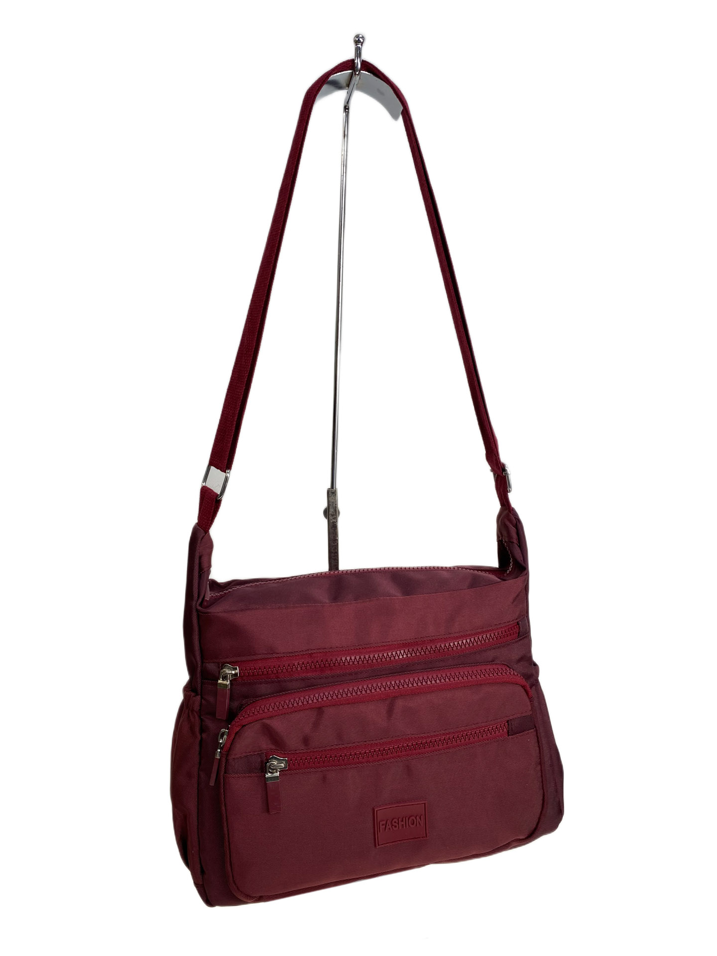 На фото 1 - Женская cумка из текстиля, цвет бордовый