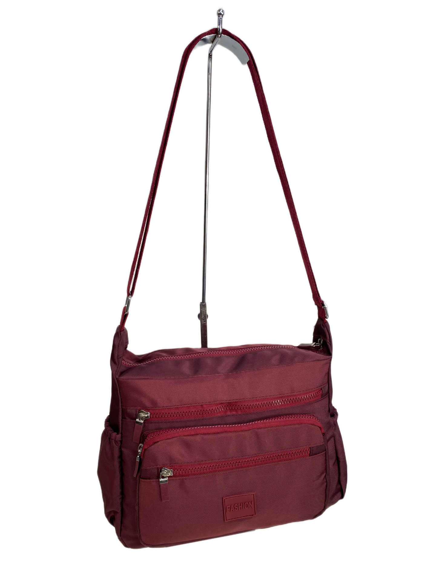 На фото 1 - Женская cумка из текстиля, цвет бордовый