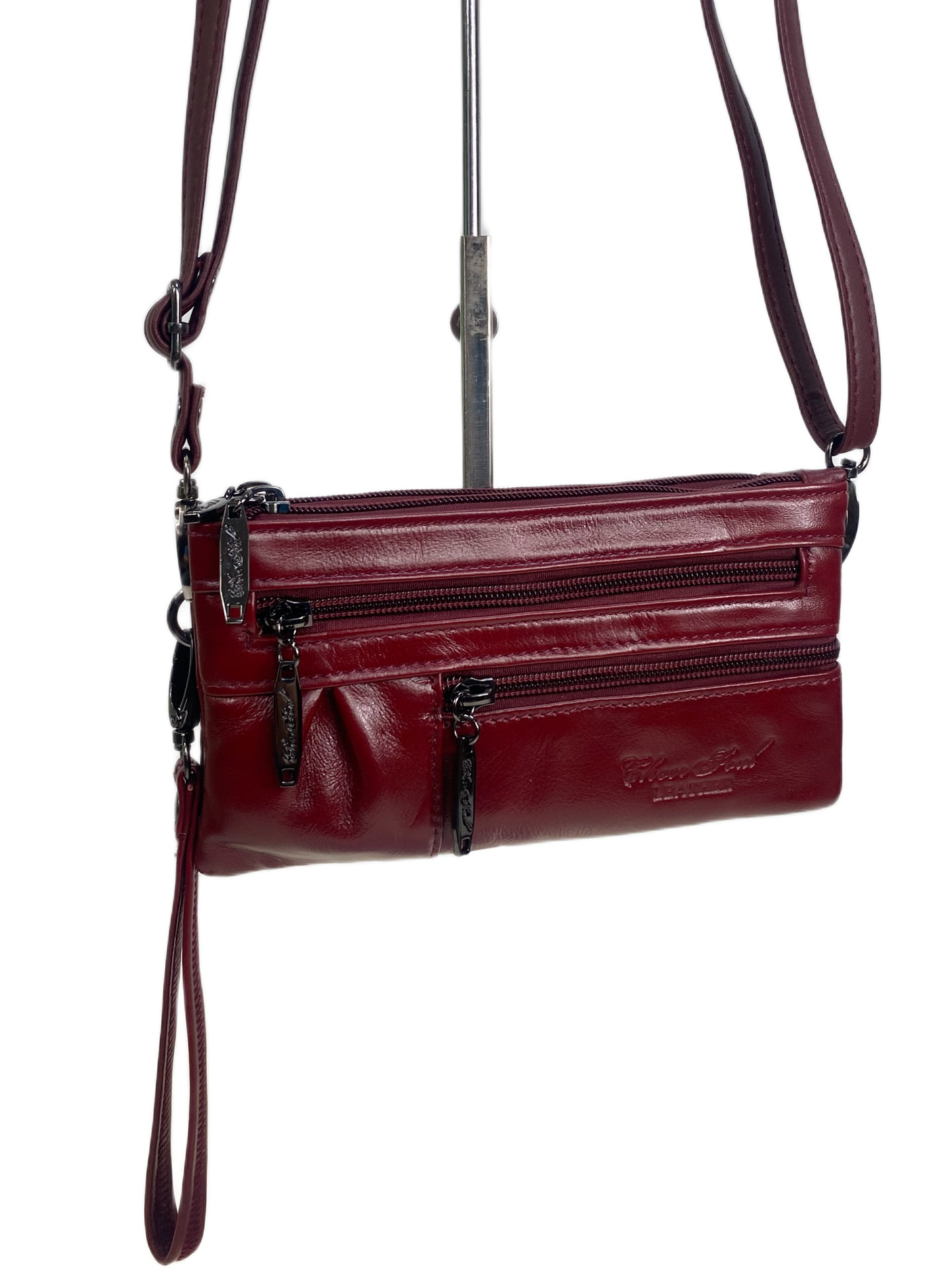 На фото 1 - Женская сумка из натуральной кожи, цвет красный