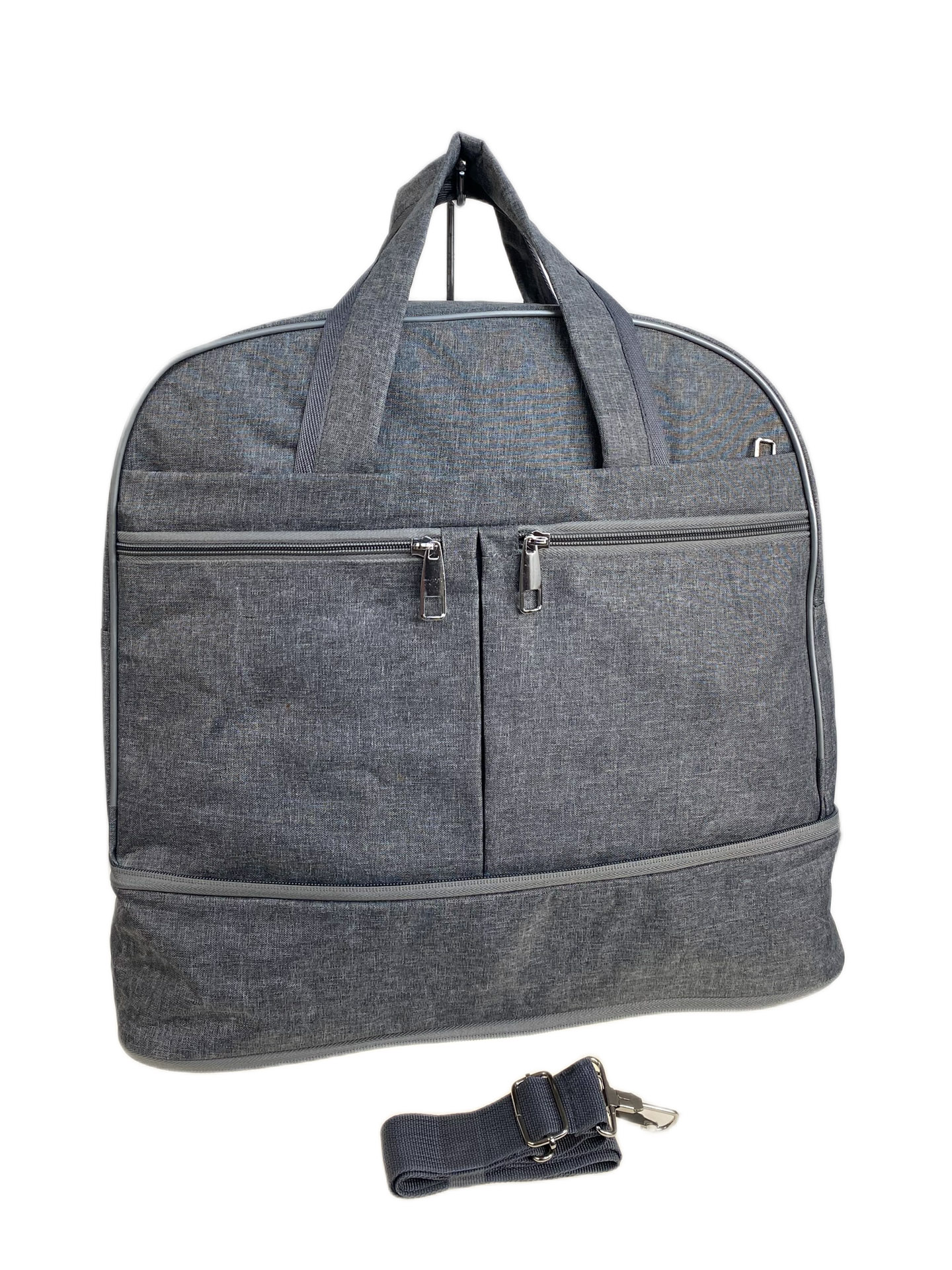 На фото 1 - Дорожная сумка из текстиля, цвет серый