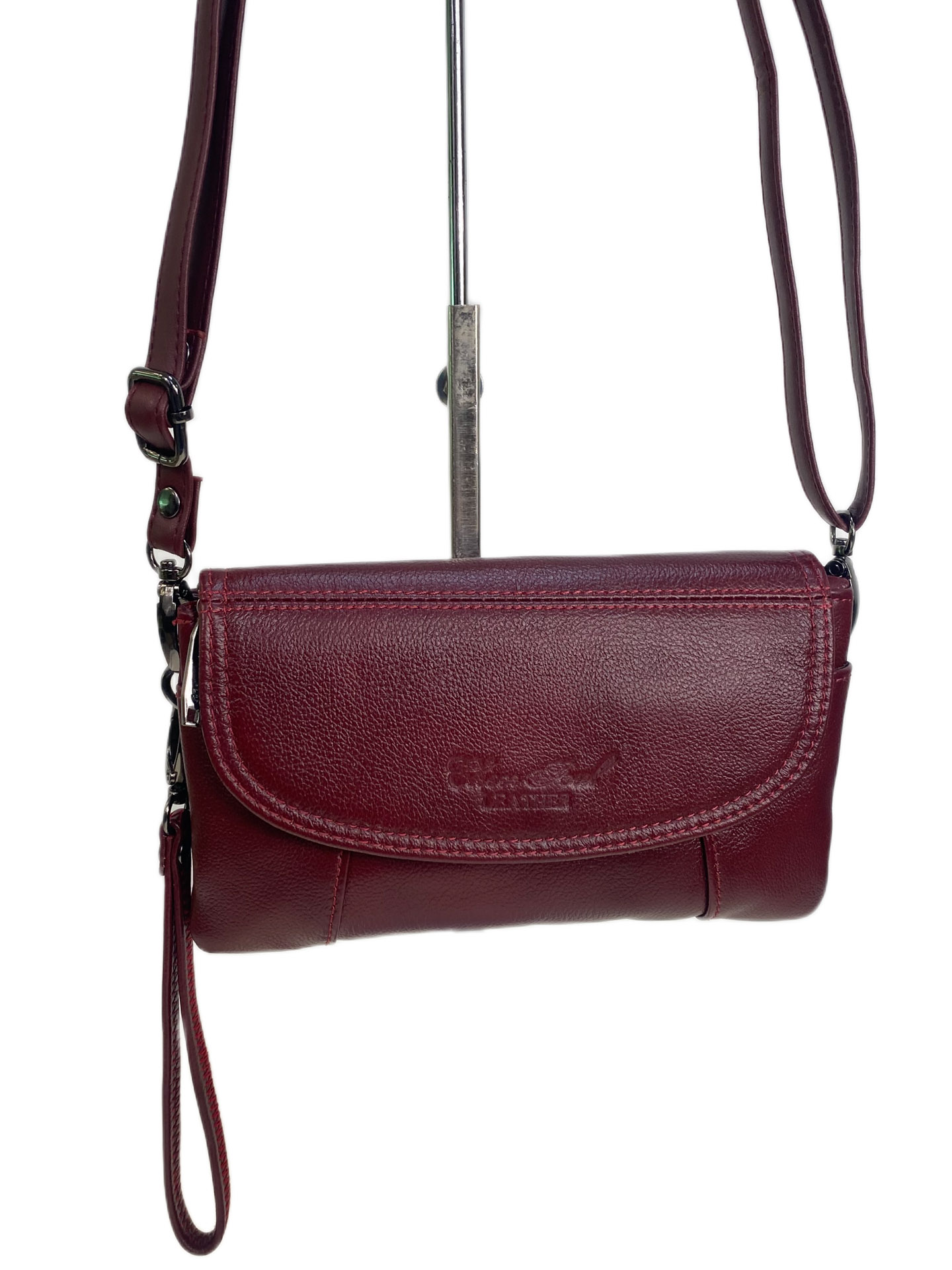 На фото 1 - Женская сумка из натуральной кожи, цвет бордо