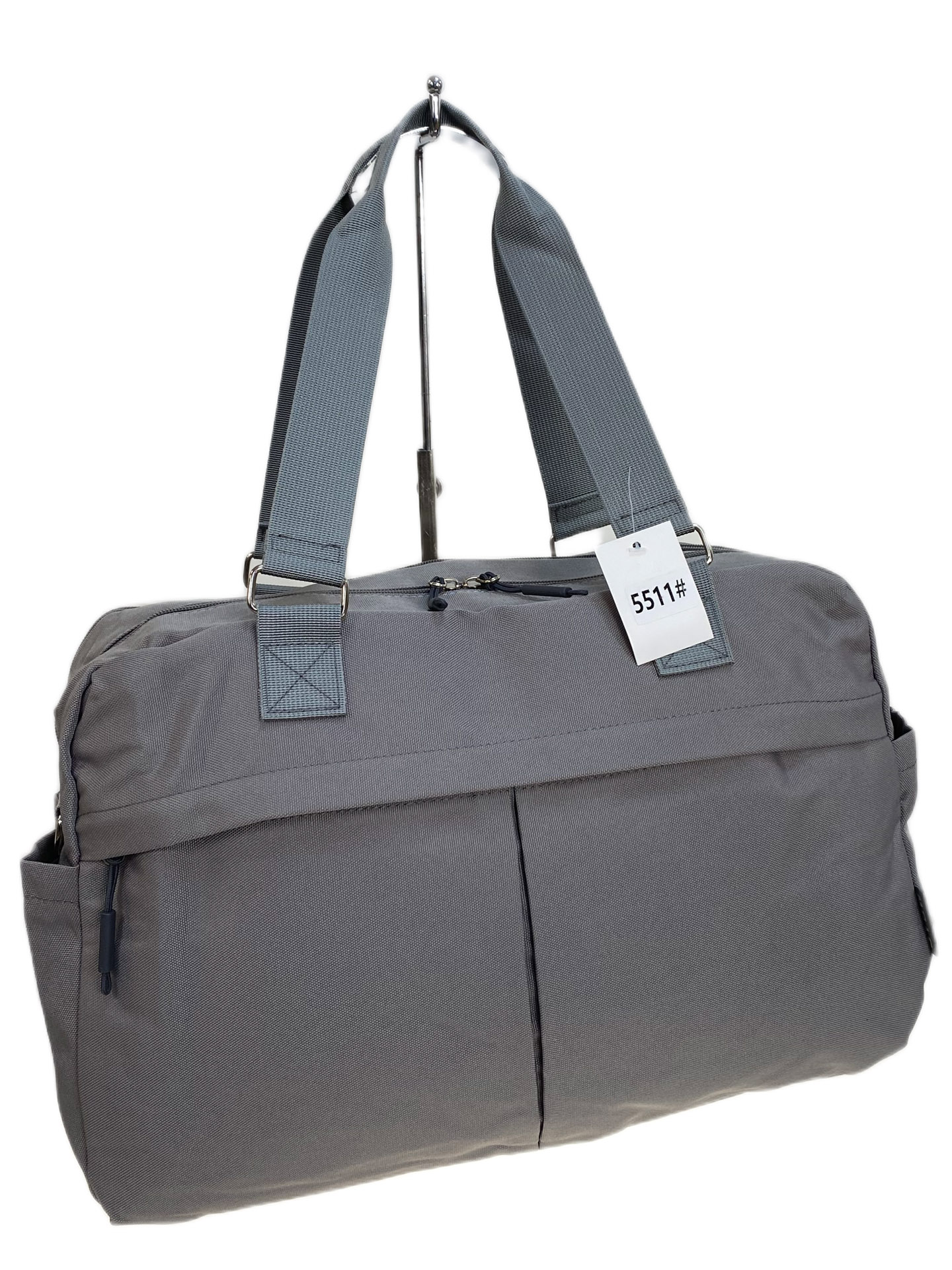 На фото 1 - Дорожная сумка из текстиля, цвет серый