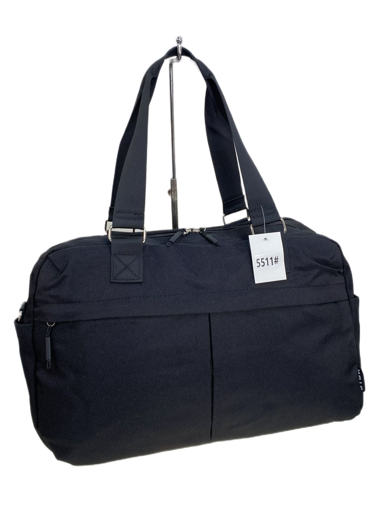 На фото 1 - Дорожная сумка из текстиля, цвет черный