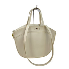 На фото 1 - Женская сумка из искусственной кожи, цвет молочный