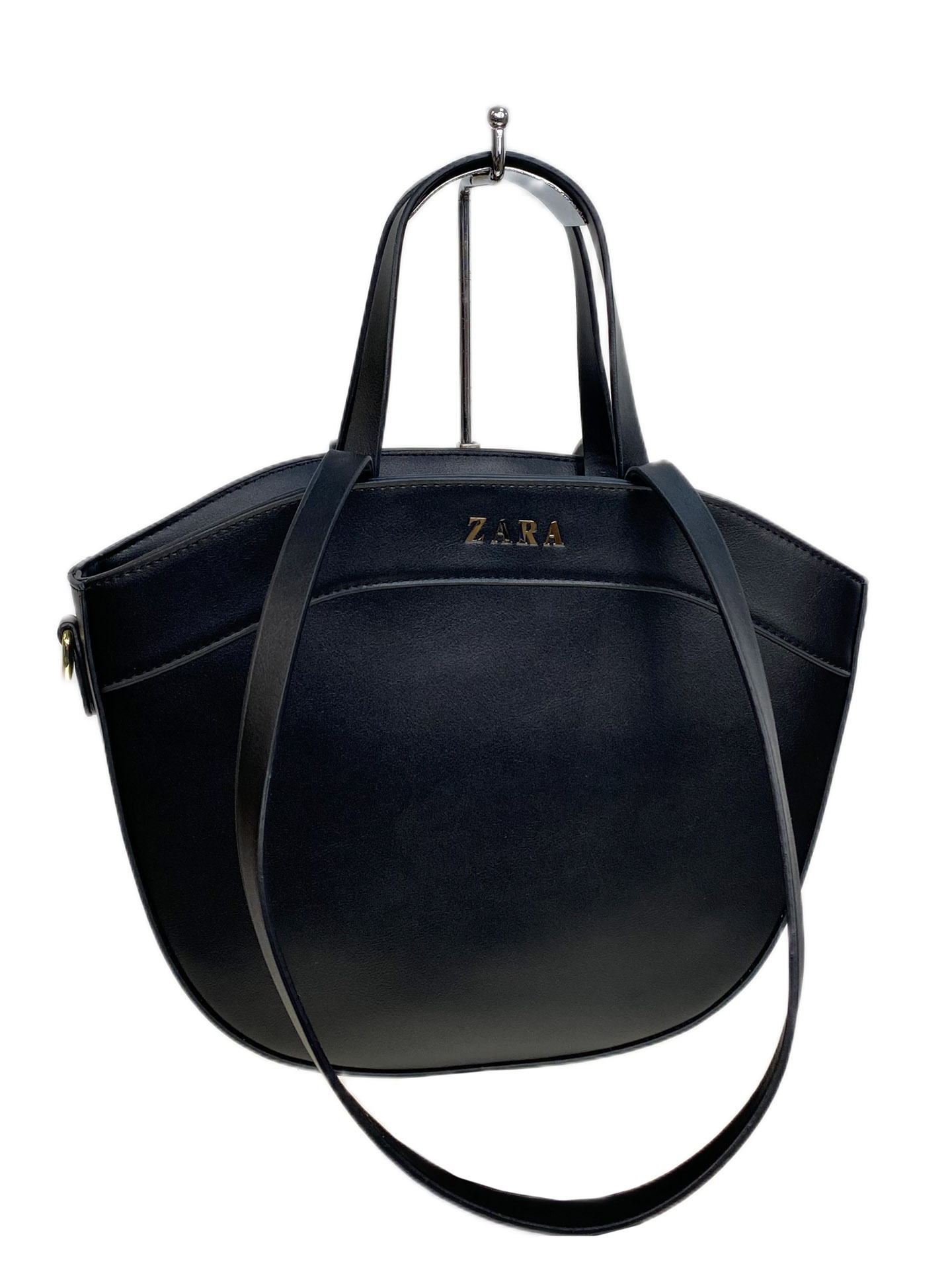 На фото 1 - Женская сумка из искусственной кожи, цвет черный