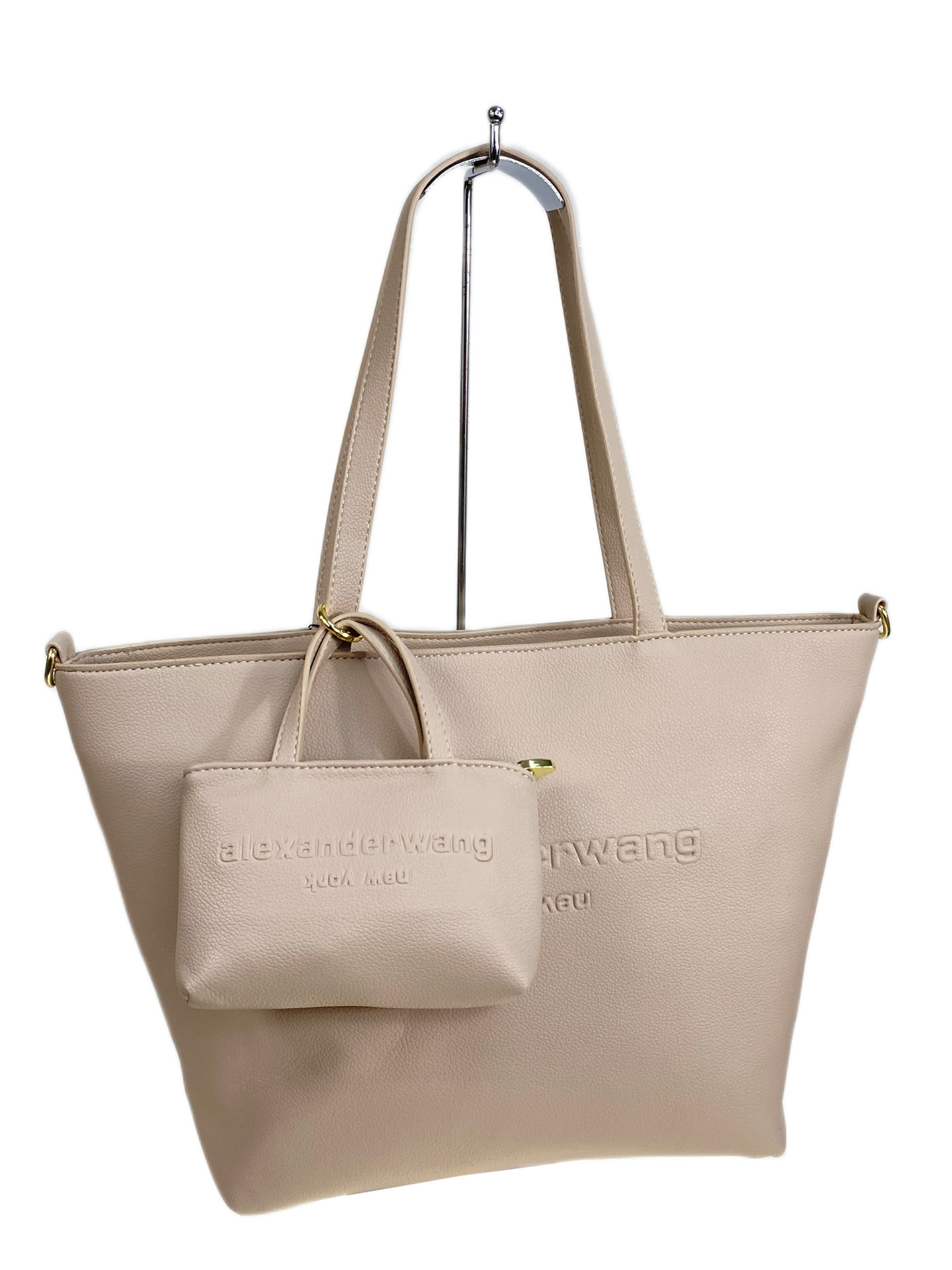 На фото 1 - Женская сумка из искусственной кожи, цвет светло бежевый