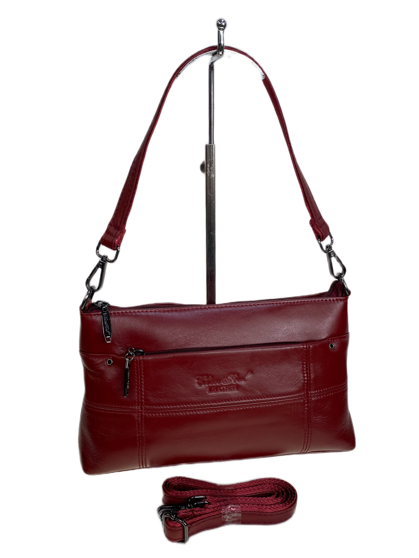 На фото 1 - Женская сумка из натуральной кожи, цвет бордовый