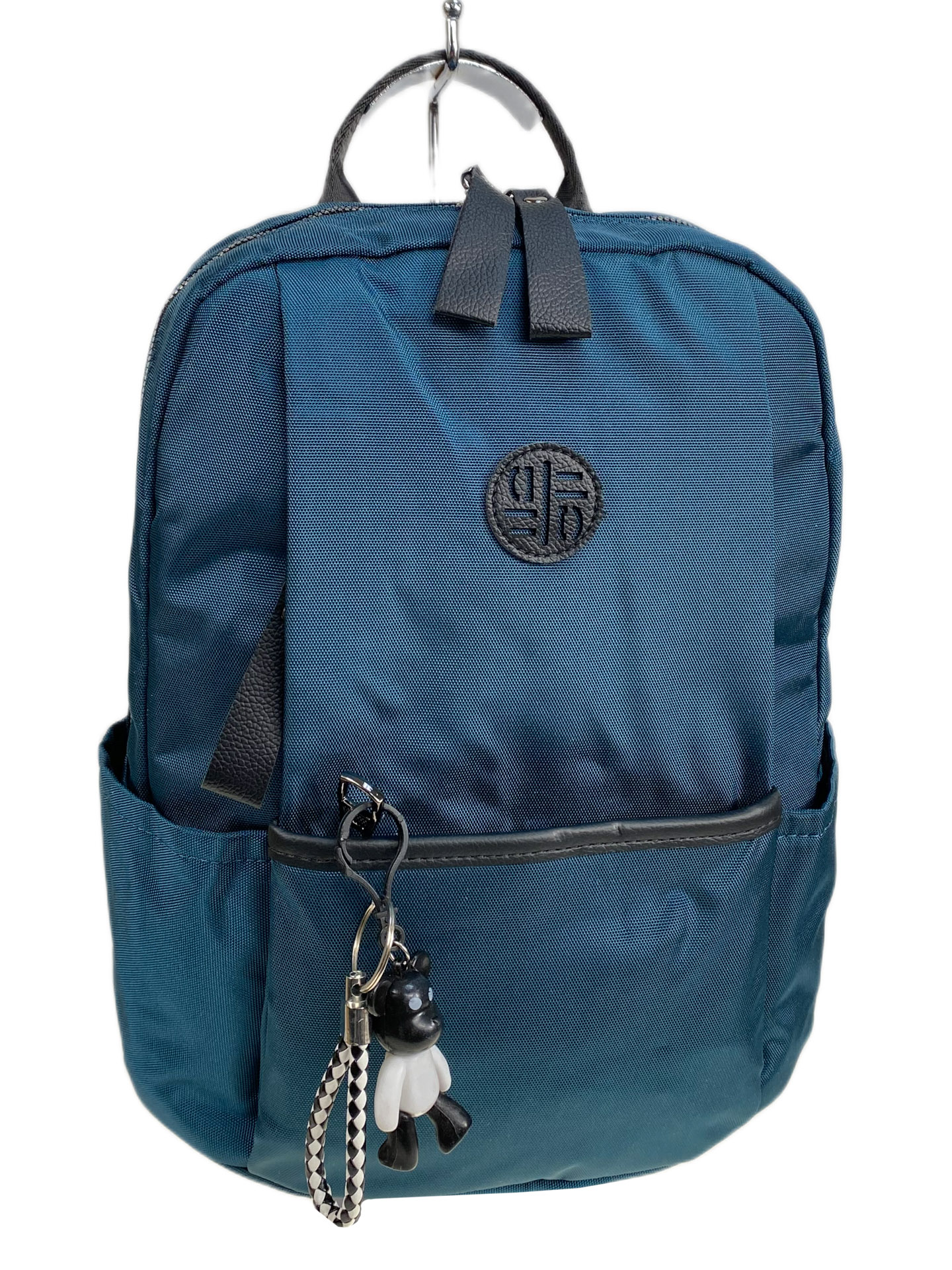 На фото 1 - Женский рюкзак из текстиля, цвет изумрудный