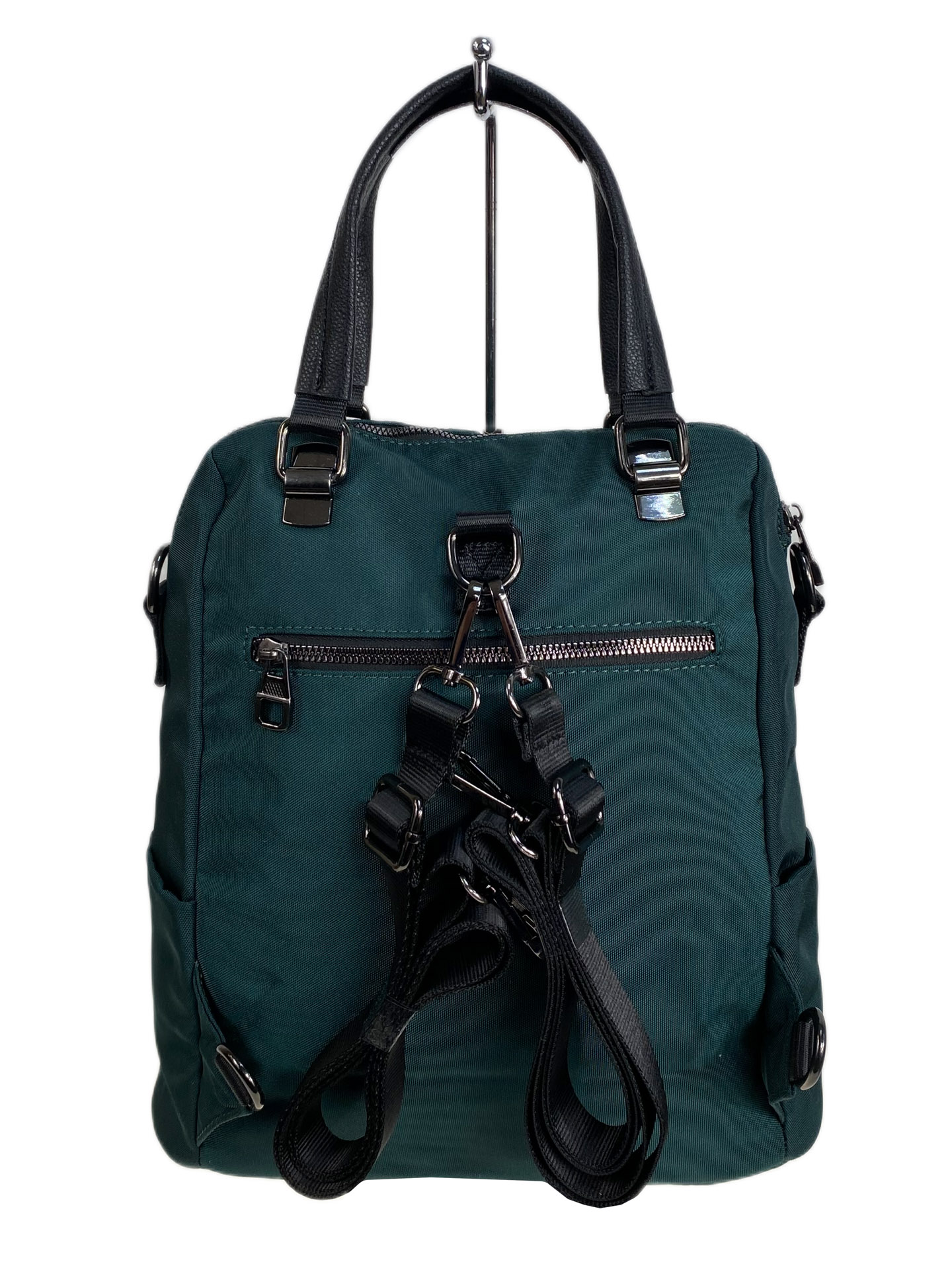 На фото 2 - Женская сумка - рюкзак из текстиля, цвет  зеленый