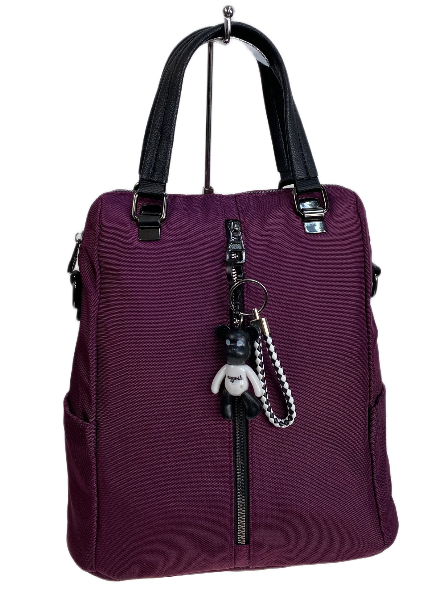 На фото 1 - Женская сумка - рюкзак из текстиля, цвет фиолетовый