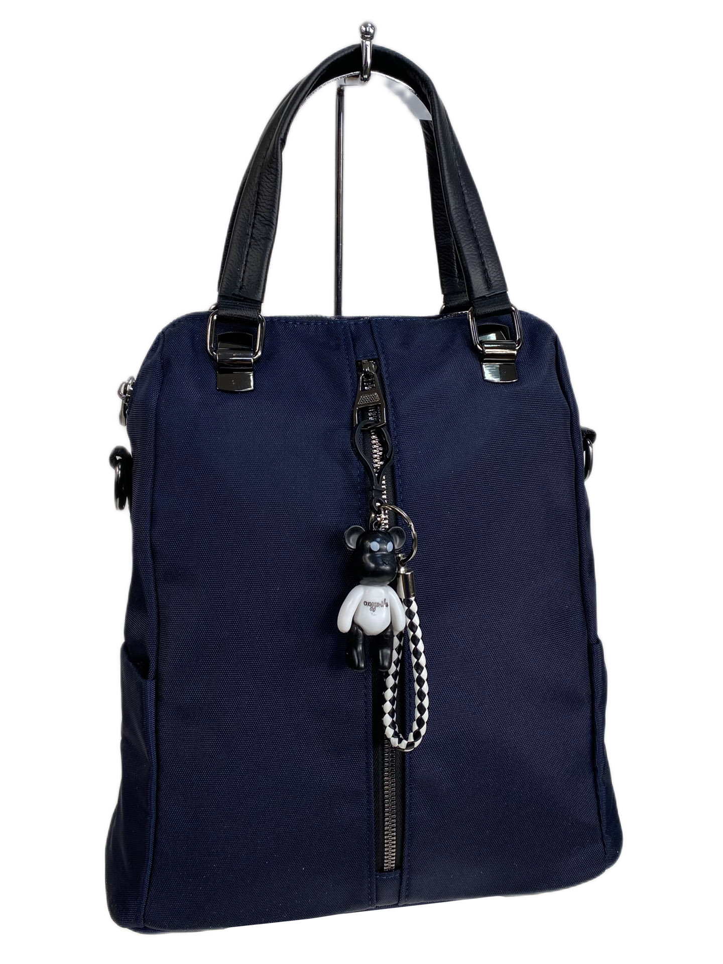 На фото 1 - Женская сумка - рюкзак из текстиля, цвет синий