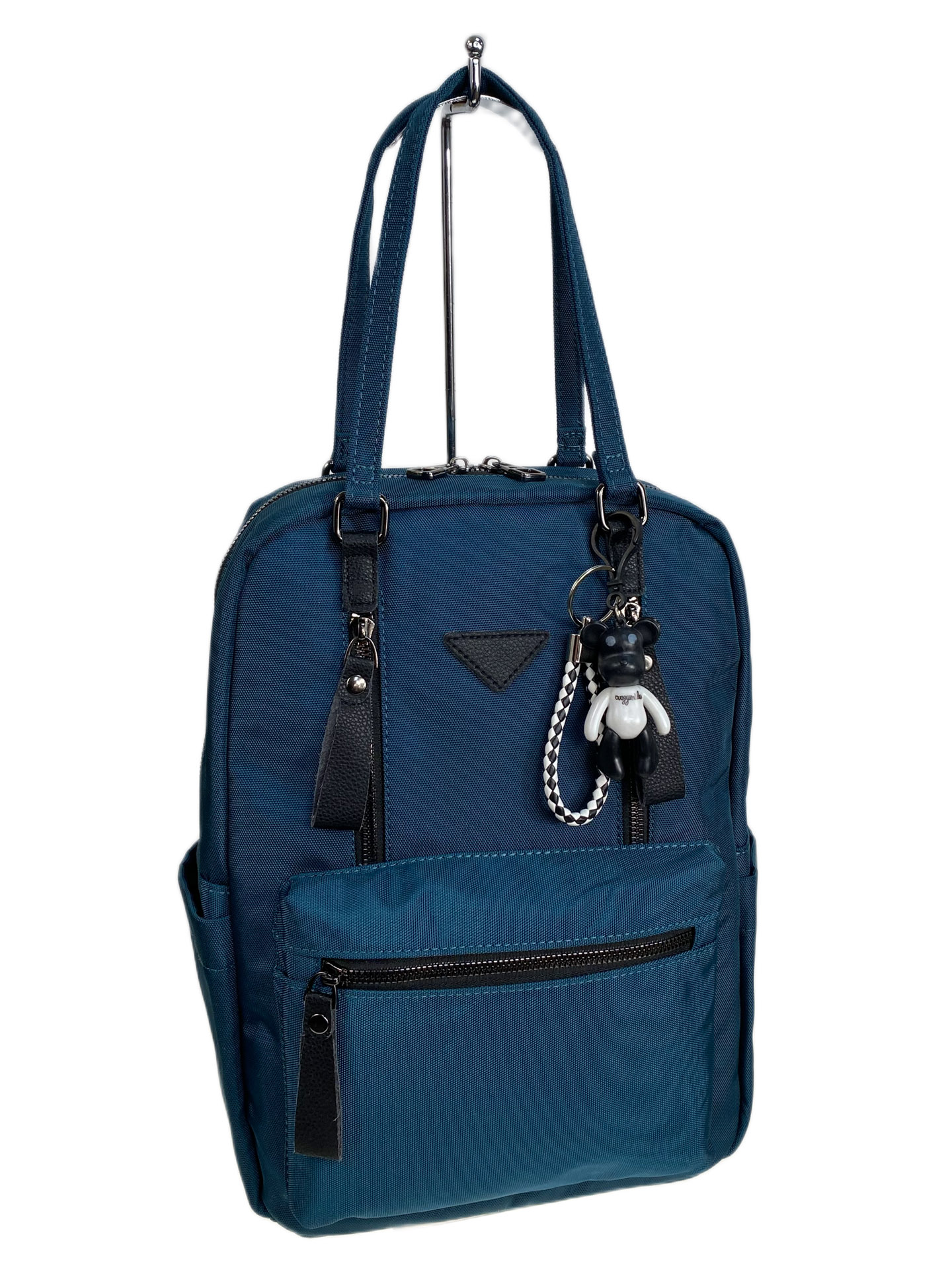 На фото 1 - Женская сумка - рюкзак из текстиля, цвет изумрудный