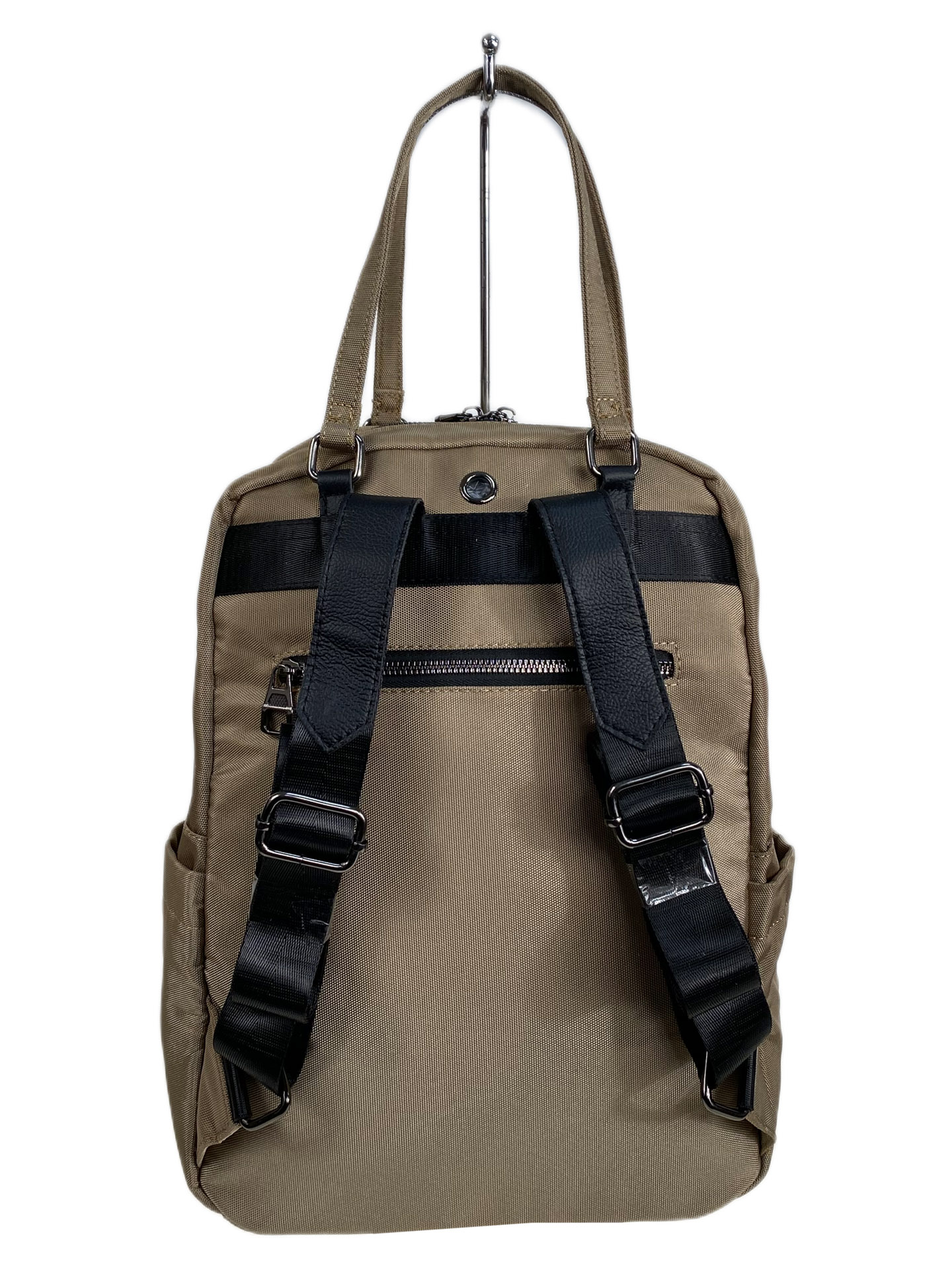 На фото 2 - Женская сумка - рюкзак из текстиля, цвет коричневый