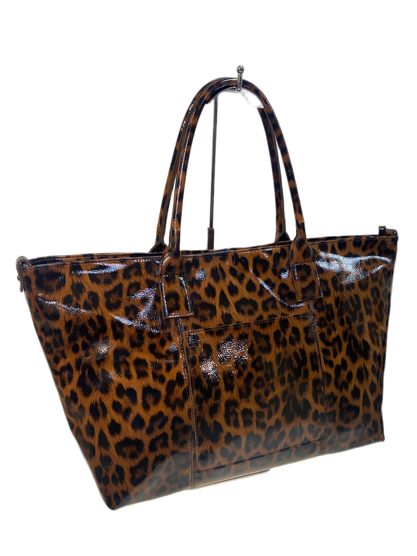 На фото 1 - Женская сумка из натуральной кожи, цвет леопард